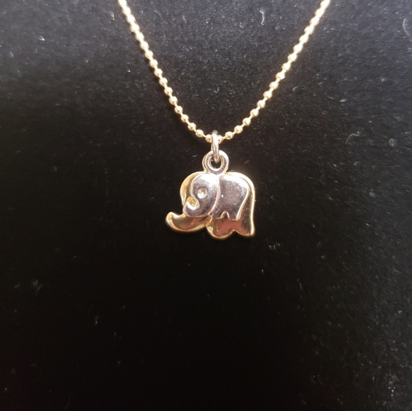 Charming Charlie Jewelry - Gold and Silver Elephant Necklace